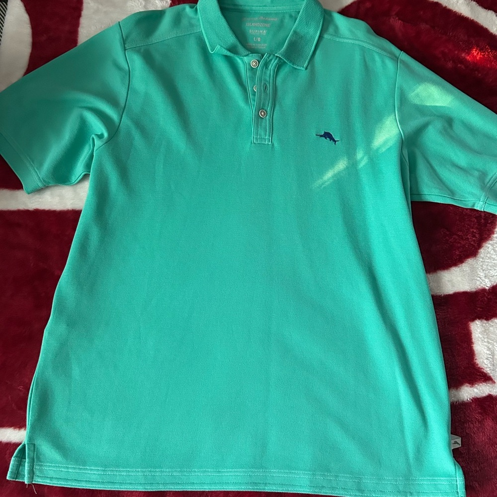 I am selling a Tommy Bahama polo.